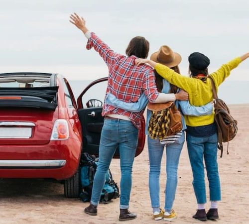 man-women-embracing-near-car-sea-coast_23-2148039078